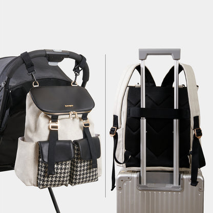 Sac à dos à langer à motif pied-de-poule
