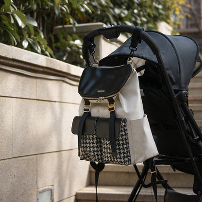 Sac à dos à langer à motif pied-de-poule